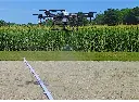 Swath Gobbler T30 Flying over boards.webp
