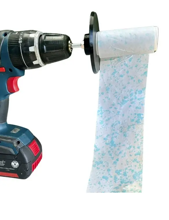 Swath Gobbler Paper Spooler on Drill with Paper.webp